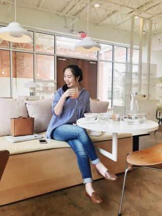 woman sitting in cafe