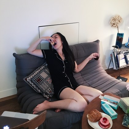 Strut with Susan snacking on couch